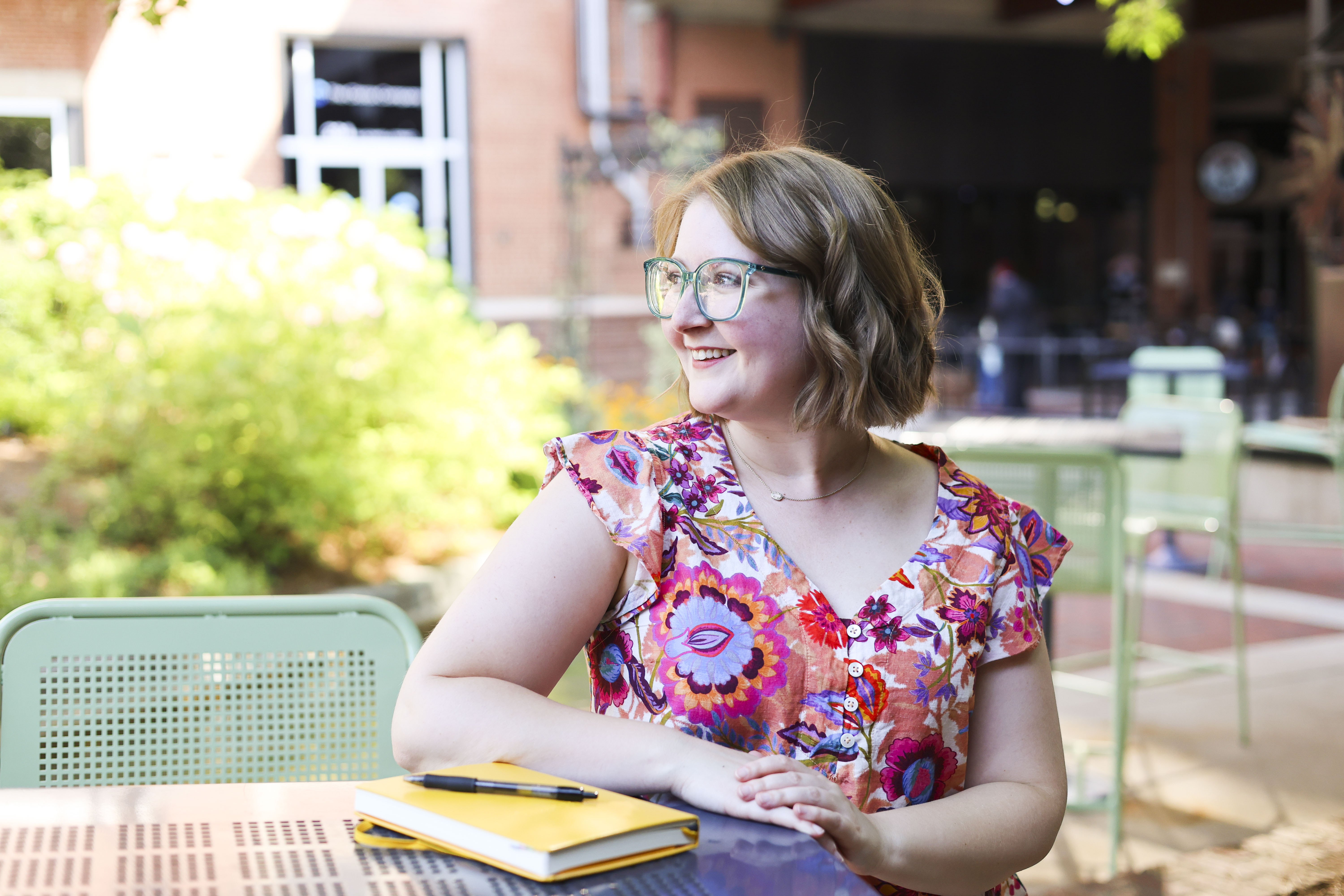 Warm, professional therapy therapist with notebook